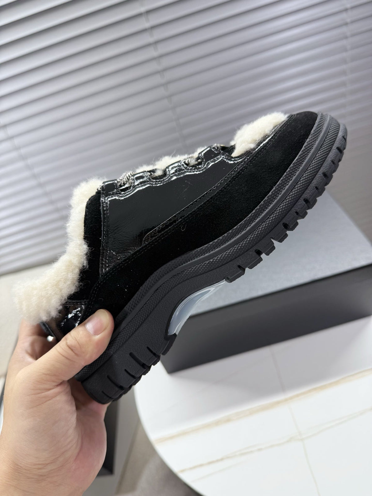 CHANEL 25S SNEAKERS WITH FUR AENTS 35MM IN BLACK CALFSKIN